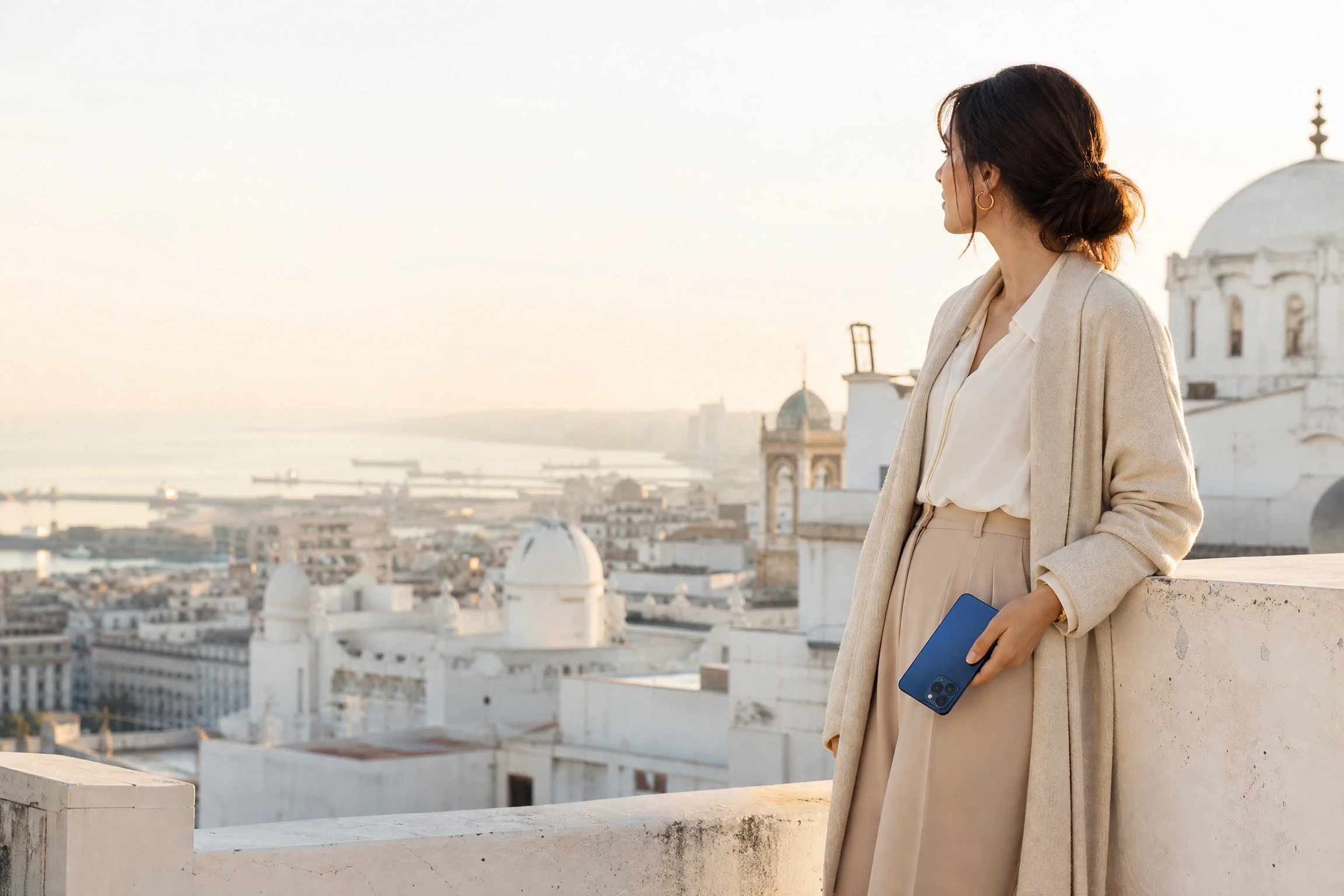 A user with a vivo smartphone on a rooftop in Algiers
